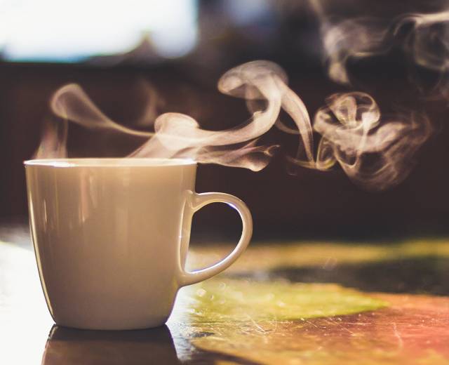 A steaming cup of coffee from a cafe in Lincoln City, OR.