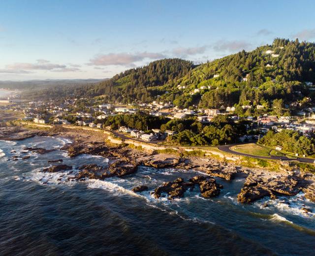 Ocean waves roll into the rocky Oregon coast in the village of Yachats